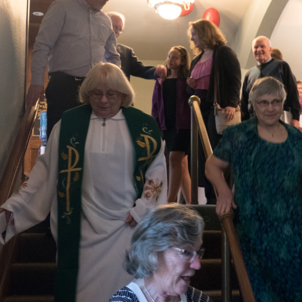 Celebrants in sanctuary after being ordained / readmitted